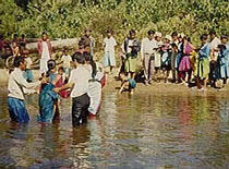 Picture of a Lisu Hill-Tribe woman being baptized