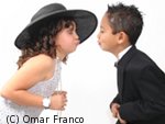 Picture of two children kissing. Copyright Omar Franco Used by permission