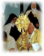 Picture of Pope with eucharist in a monstrance idol