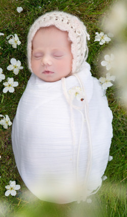 Image of a baby in swaddling clothes